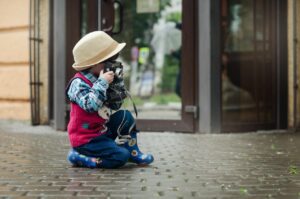 camera, boy, hat, kids, baby, kid, street, city, child, building, smile, keeps, portrait of a child, photographer, model, the photography club, hobby, enthusiasm, camera, camera, kids, street, child, photographer, photographer, photographer, hobby, hobby, enthusiasm, enthusiasm, enthusiasm, enthusiasm, enthusiasm